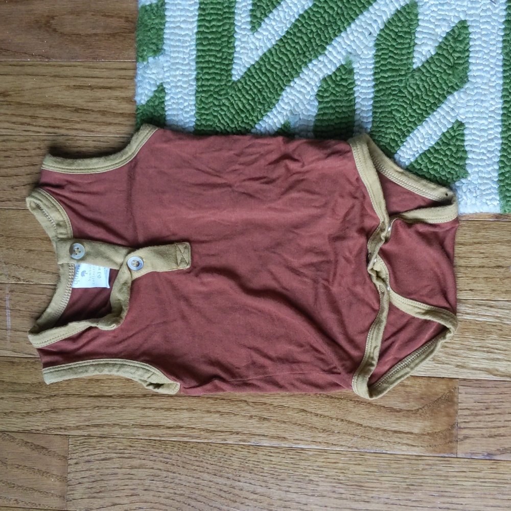 Kate Quinn | sleeveless onsie